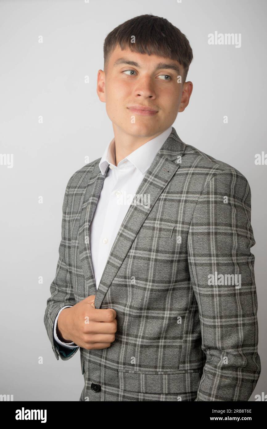 Young entrepreneur wearing a suit jacket and open neck shirt without a