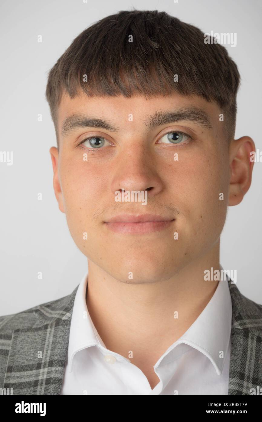 Young entrepreneur wearing a suit jacket and open neck shirt without a