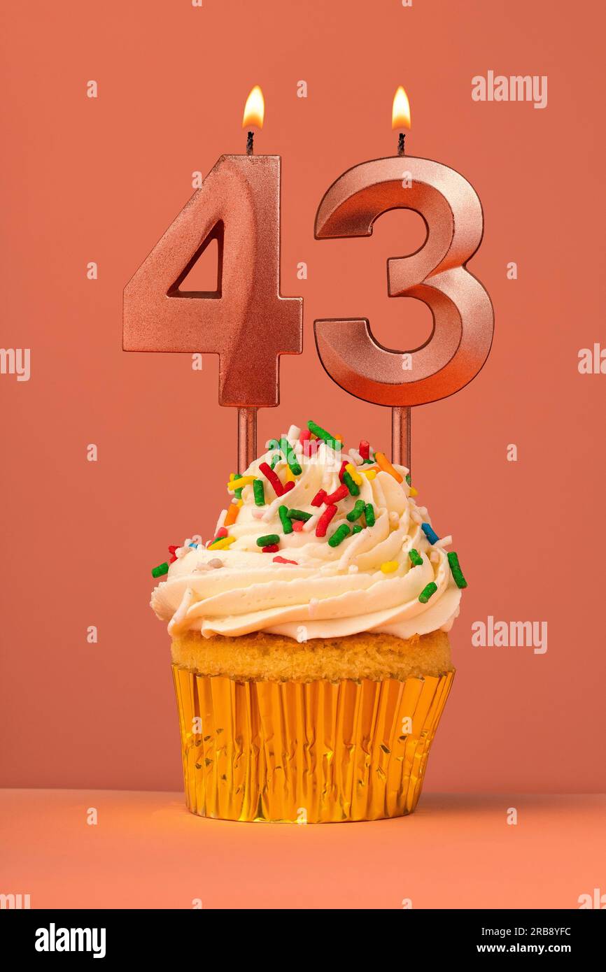 Birthday cake with candle number 43 - Coral fusion background Stock ...