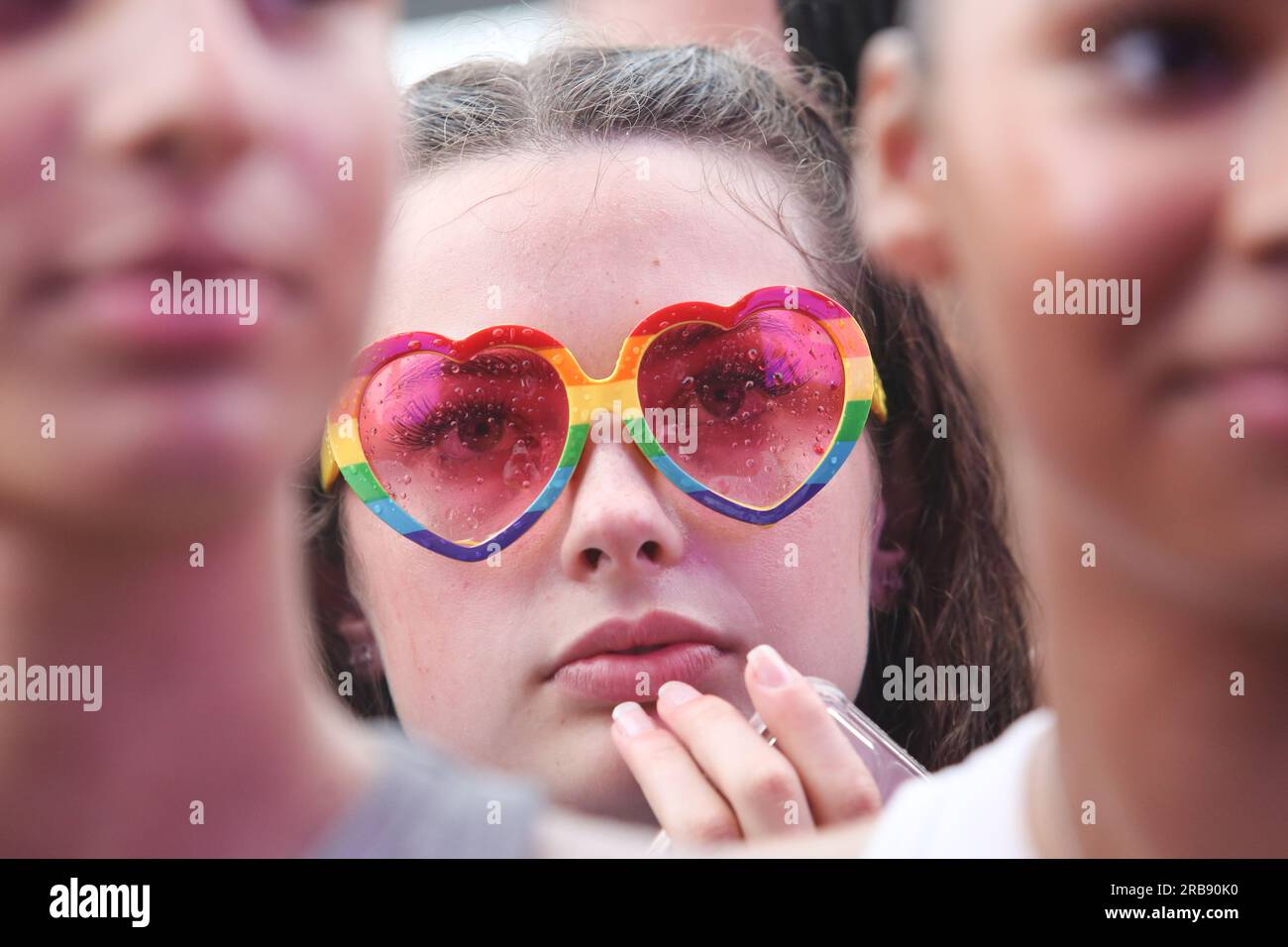 London Uk July 8 2023 A Woman In The Crowd During Heavy Rain At The Wireless Festival In