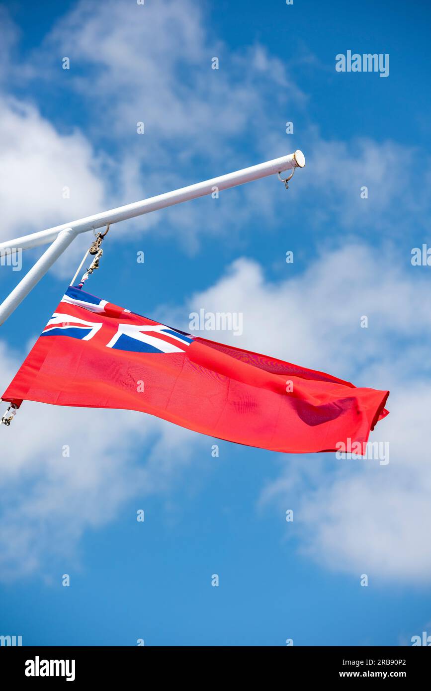merchant marine, merchant navy, red ensign, british shipping, maritime flag of great britain, mercantile marine flag, red duster. Stock Photo