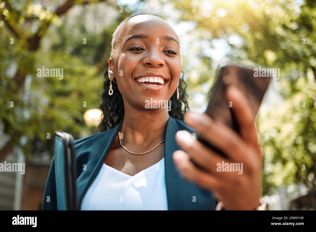 Happy black woman, phone and city for social media, communication or ...