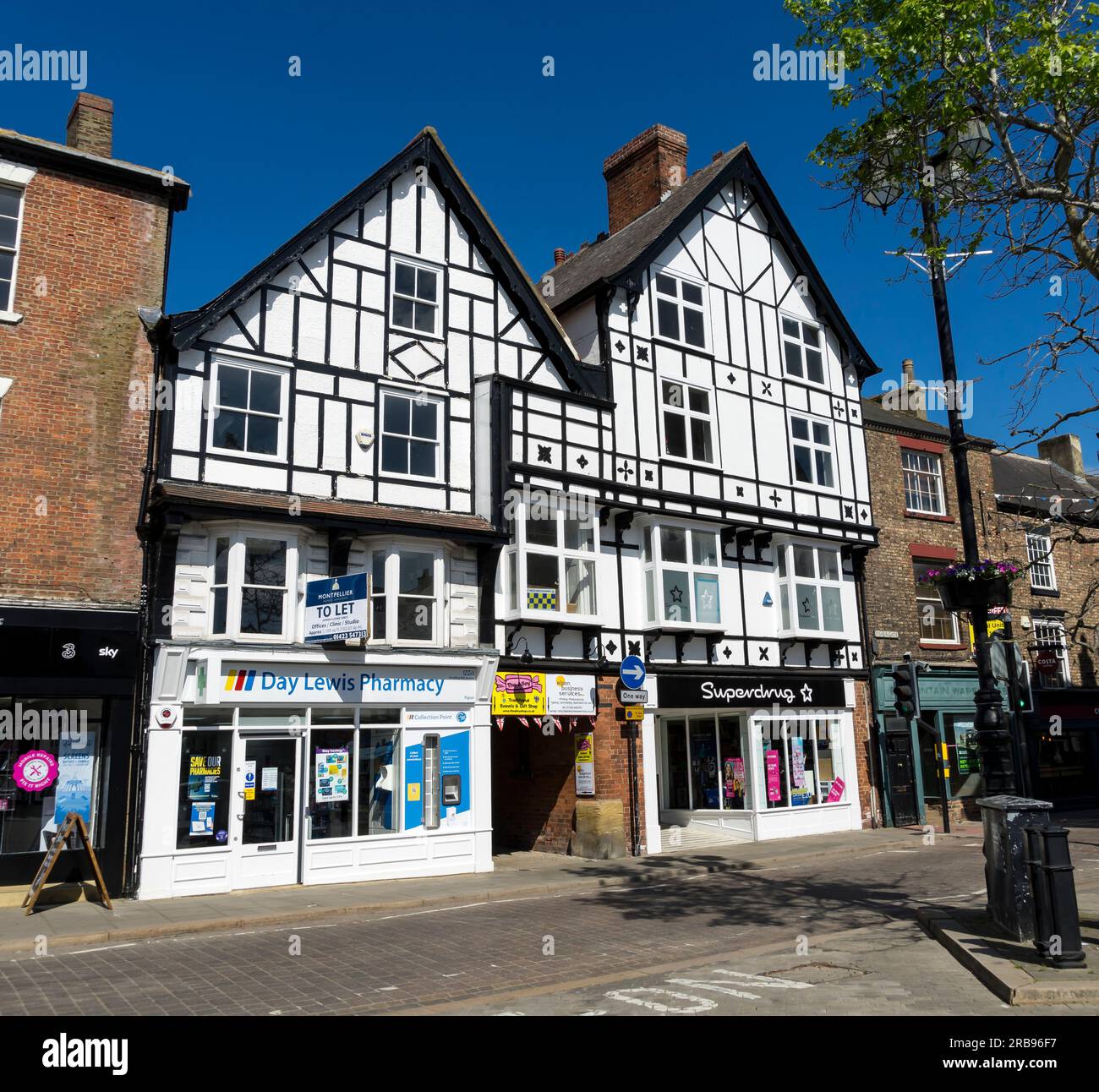 Black and white wood frame property, Market Place West, Ripon city