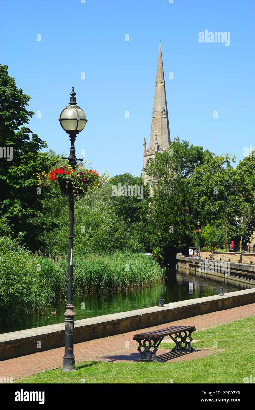 A riverside view to All Saints Church, St Ives, Cambridgeshire Stock Photo