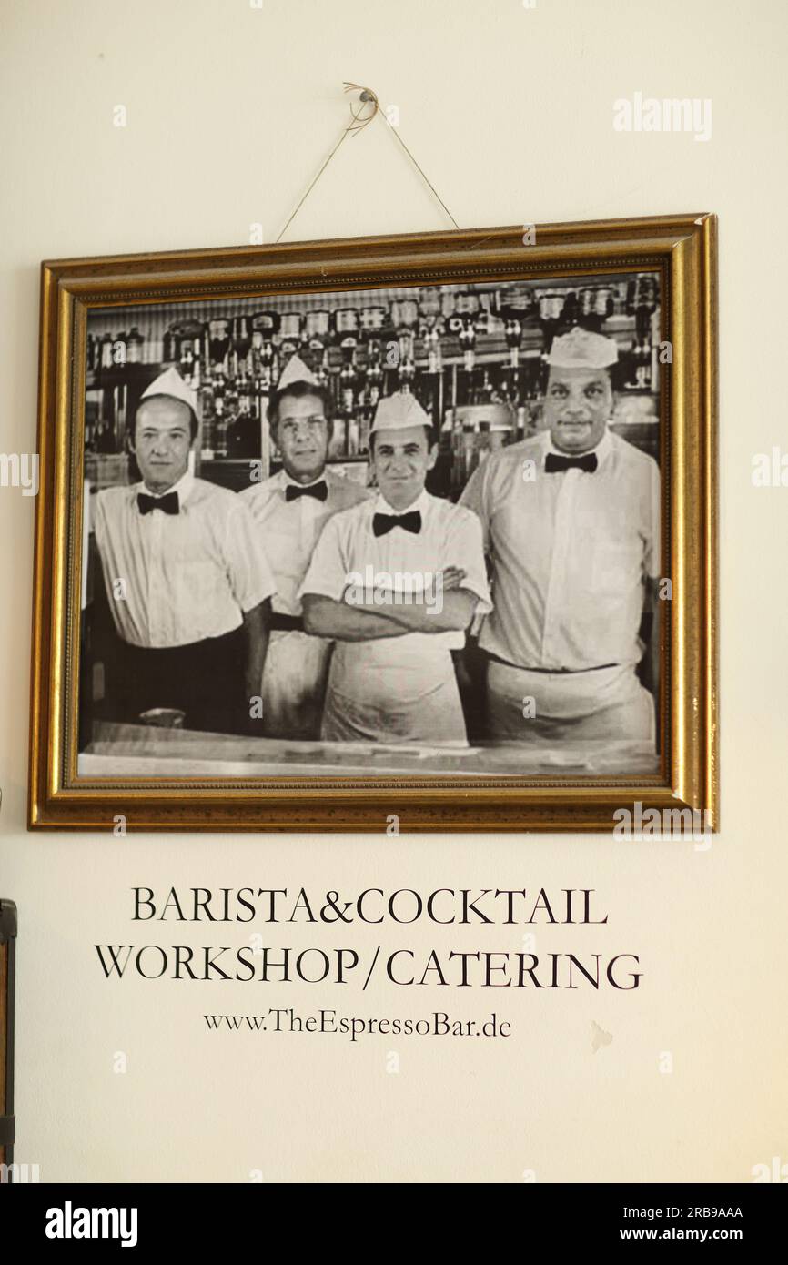 Baristas in espresso bar vintage photo on wall Stock Photo
