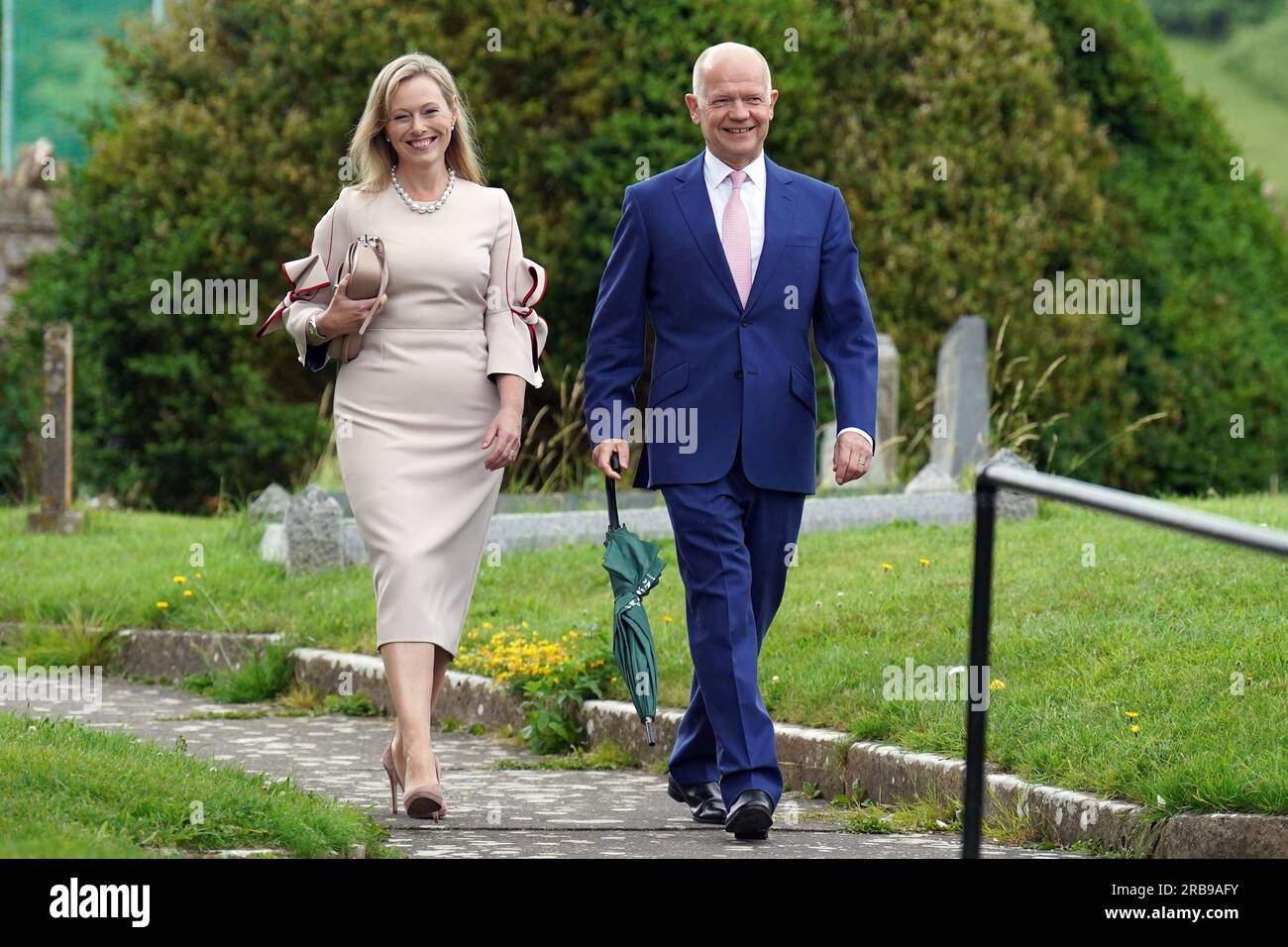 William Hague and wife Ffion arrive at St Mary's Church in Brunton, Somerset, for the wedding of former chancellor George Osborne and his former adviser Thea Rogers. Picture date: Saturday July 8, 2023. Stock Photo