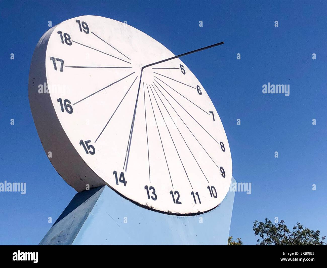 Traditional sun clock keeping time around 1400h Stock Photo Alamy