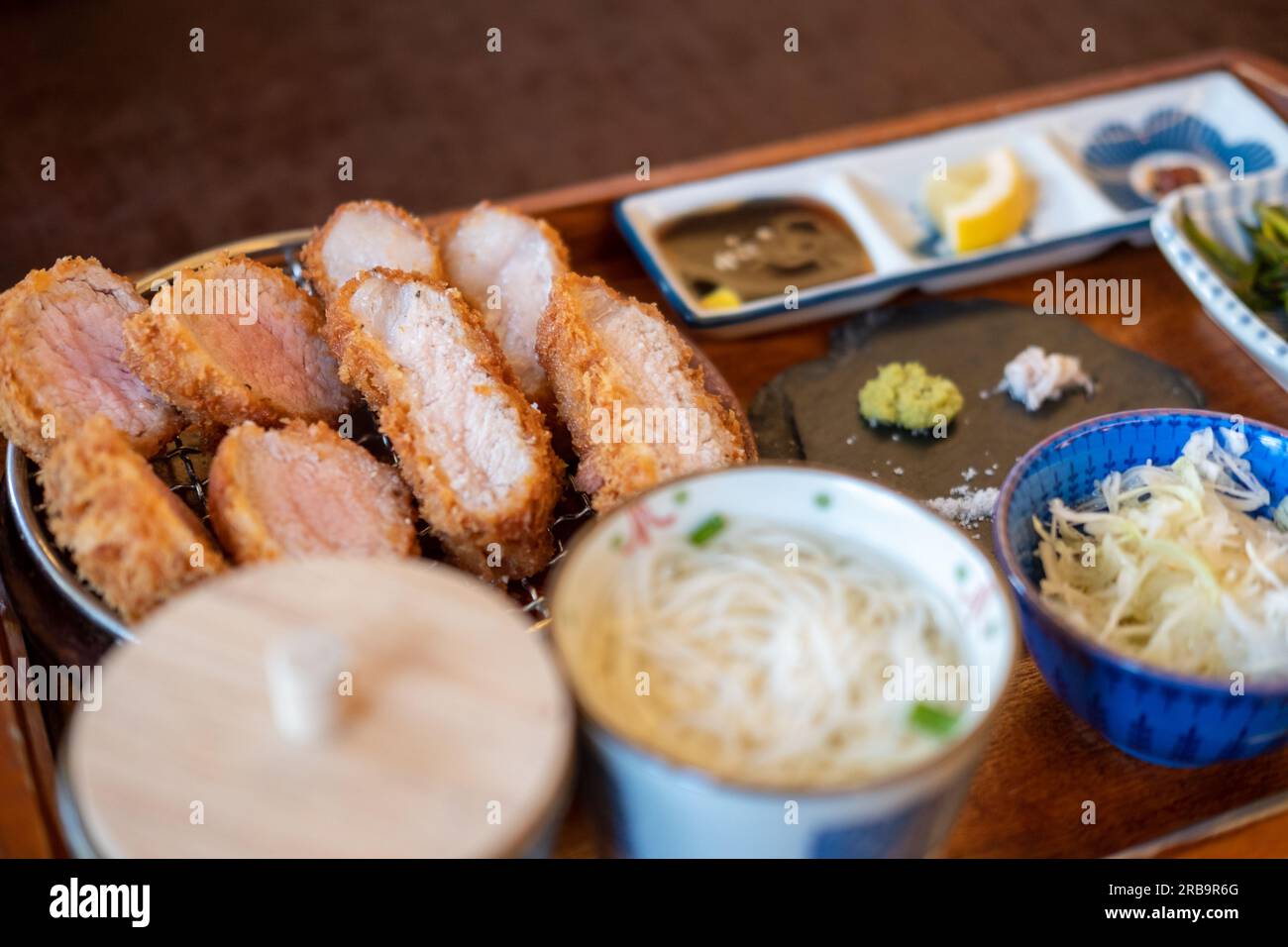 Sous Vide tonkatsu, Fried Pork with side dishes serve on plate in restaurant Stock Photo Alamy
