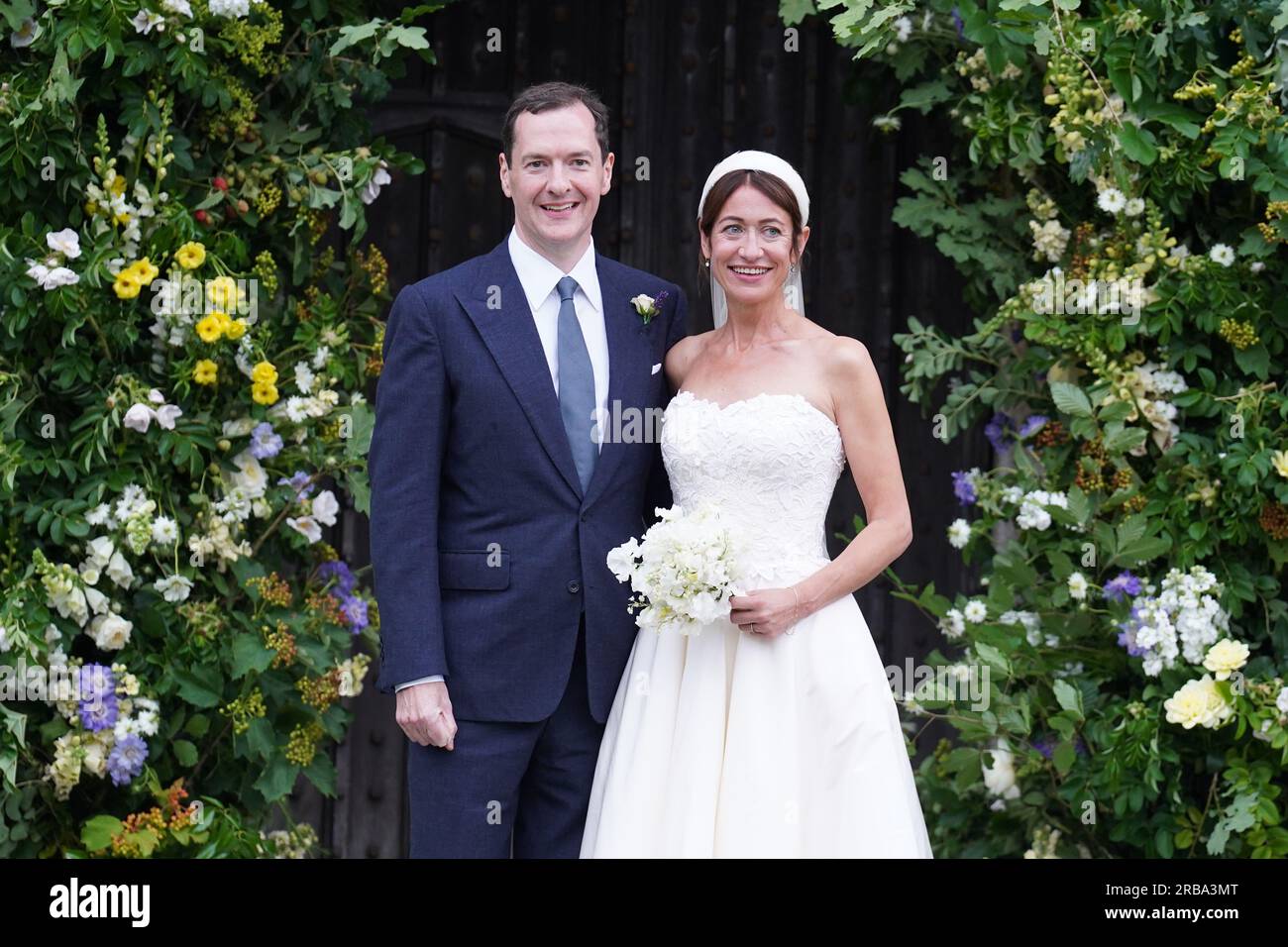 Former chancellor George Osborne with his wife and former adviser, Thea Rogers, outside St Mary's Church in Brunton, Somerset, following their marriage. Picture date: Saturday July 8, 2023. Stock Photo