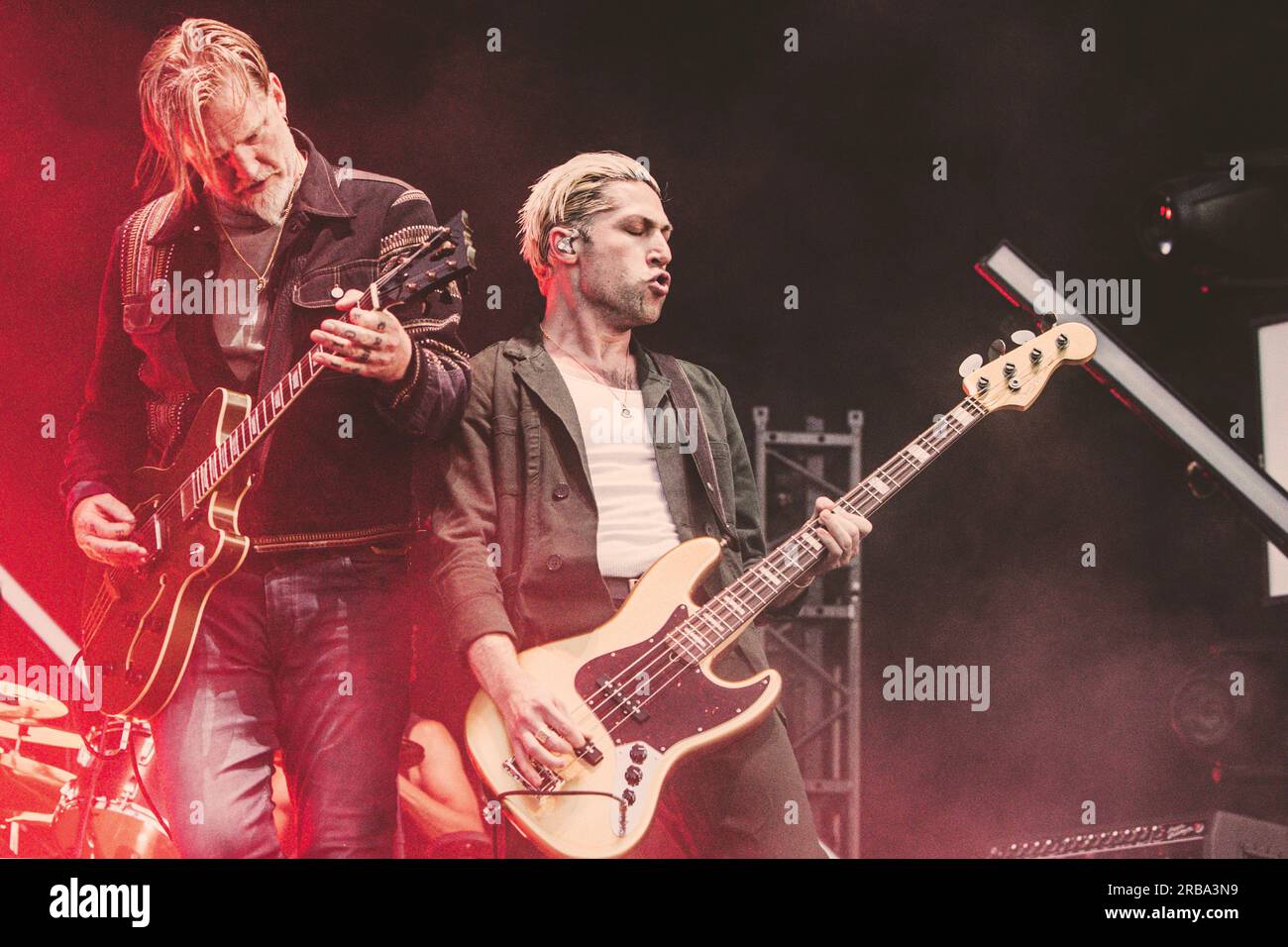 Josh Homme and Michael Shuman with their band Queens of the