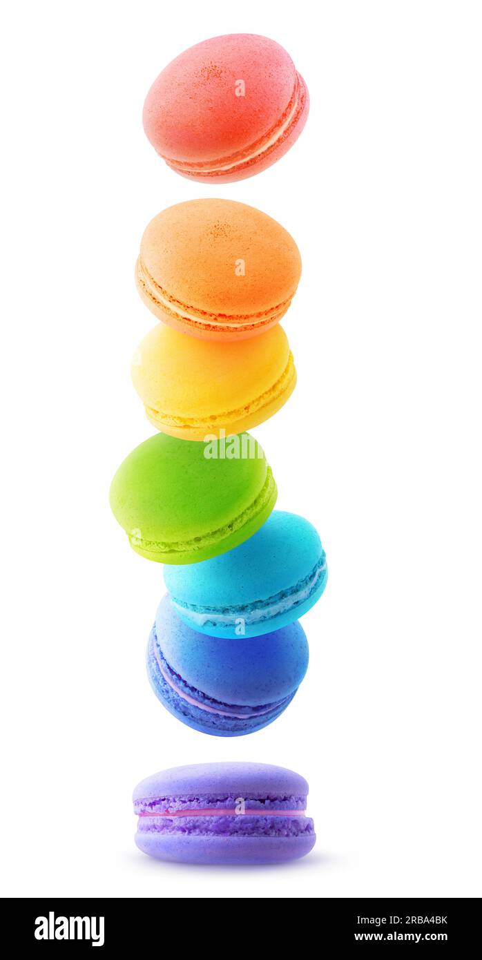Falling macaroons of rainbow colors, isolated on white background Stock Photo