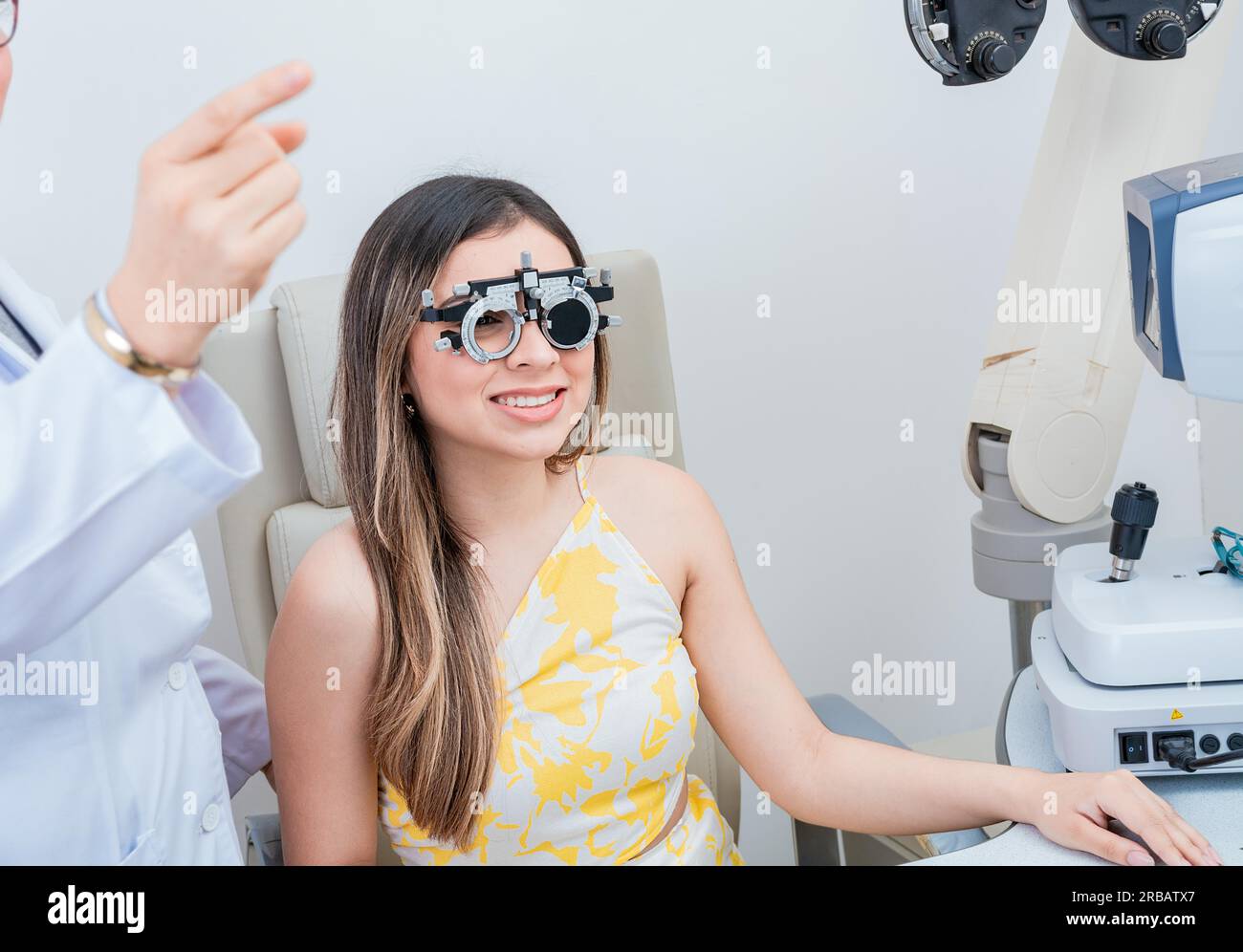 Optometry eye health concept. Optometrist assisting patient with