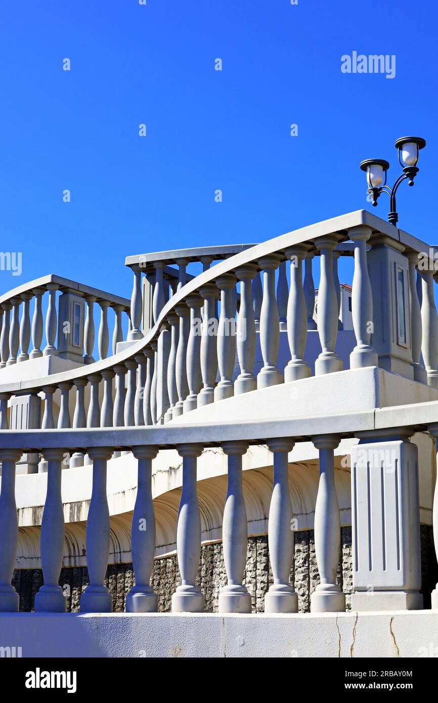 A European-style white balcony connecting the Sky Deck and the Rainbow Deck on the coast of Atami Stock Photo