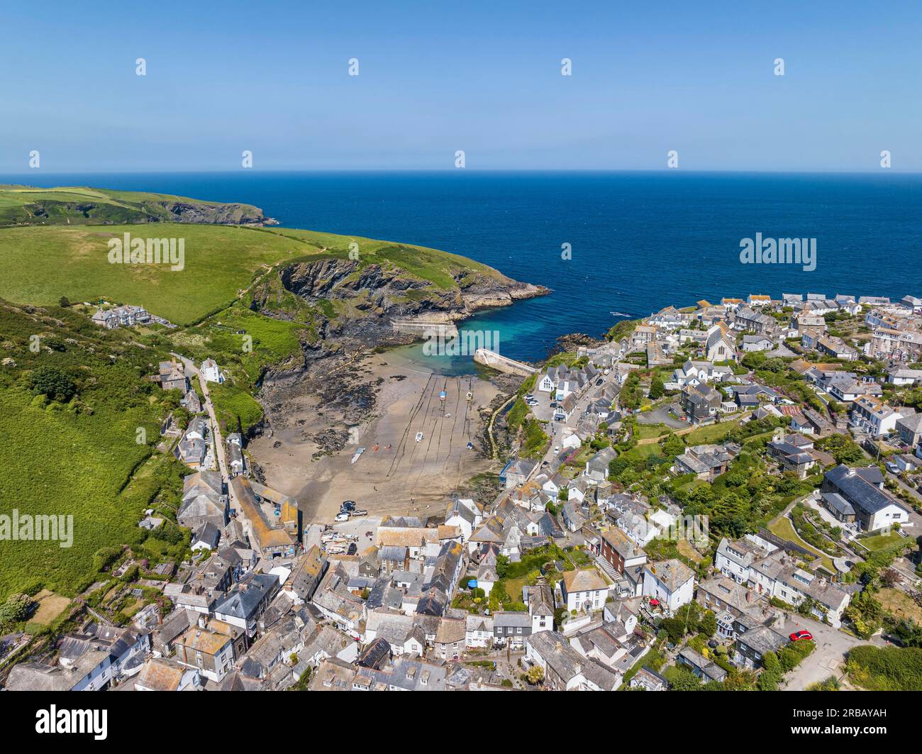 Port Isaac Sign Aerial view of Port Isaac, with the harbour at low tide, North Cornwall ...