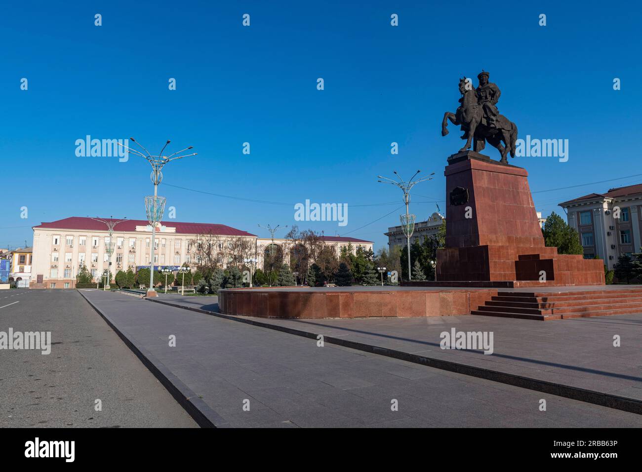 Taraz Akimat City Hall with Statue of Baydibek Batyr Riding a Horse, Taraz, Kazakhstan Stock Photo