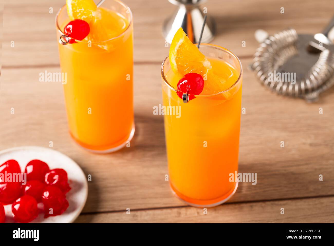 Tequila Sunrise Cocktail refreshment tequila, fresh orange juice, fresh lime juice, orange liqueur and grenadine Stock Photo