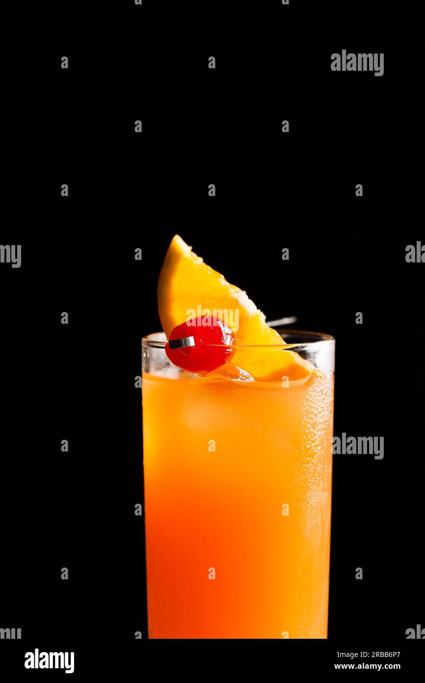 Tequila Sunrise Cocktail refreshment tequila, fresh orange juice, fresh lime juice, orange liqueur and grenadine Stock Photo