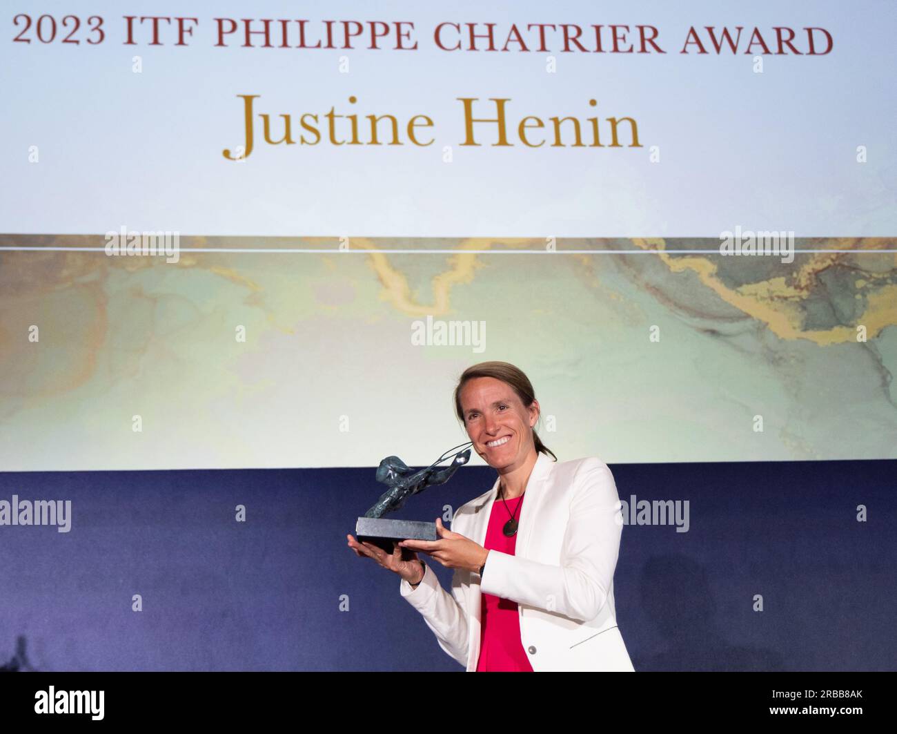 London, UK. 08th July, 2023. Former tennis number 1 Justine Henin poses with her trophy during the ceremony for the ITF's Philippe Chatrier Award, at the Victoria & Albert museum, in London, UK, Saturday 08 July 2023. Belgian Henin receives the award during the 2023 Wimbledon grand slam tennis tournament at the All England Tennis Club, in south-west London, Britain. BELGA PHOTO BENOIT DOPPAGNE Credit: Belga News Agency/Alamy Live News Stock Photo