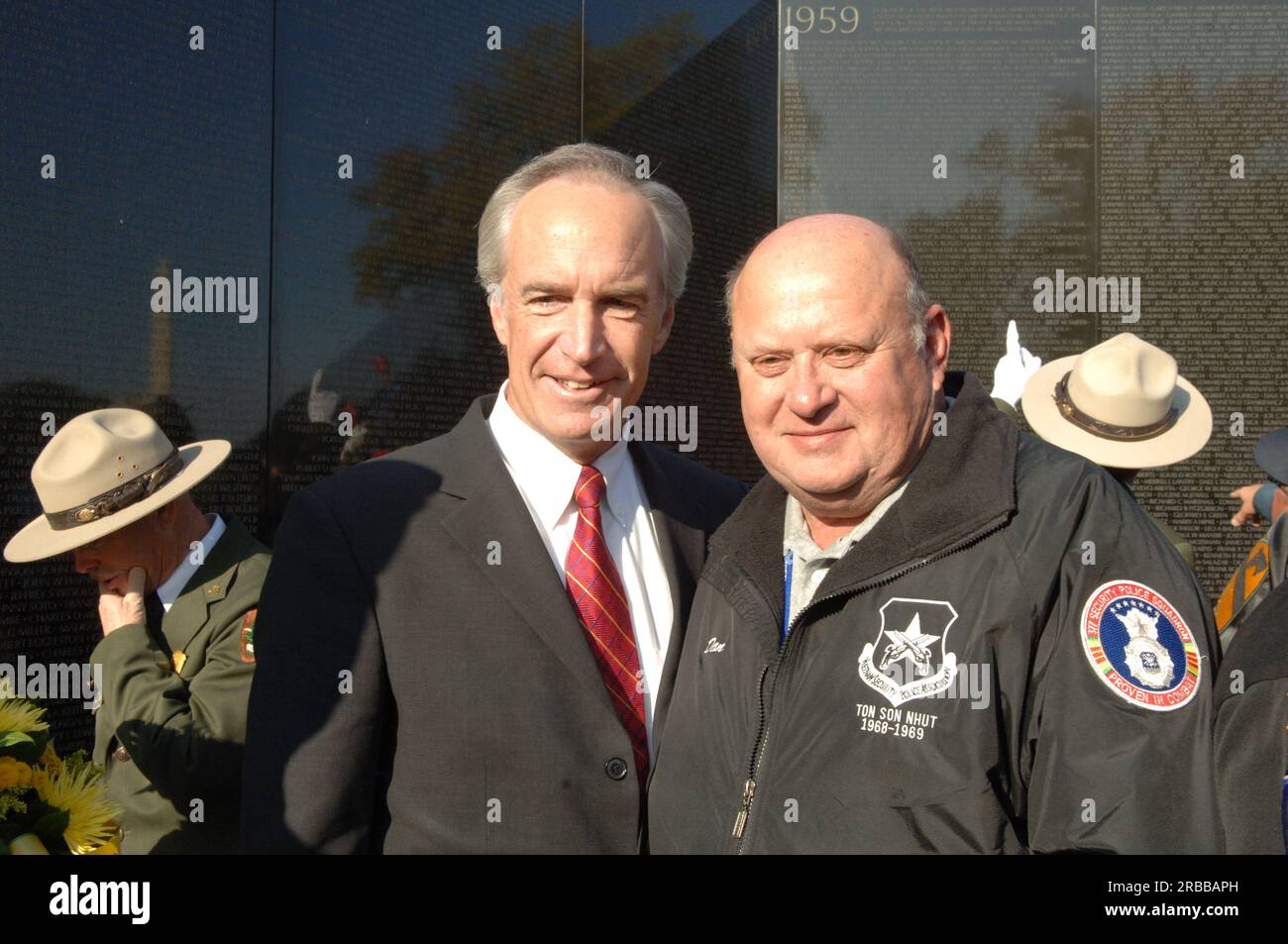 Veterans Day ceremony and aftermath at the Vietnam Veterans Memorial, Washington, D.C., where Secretary Dirk Kempthorne delivered the opening remarks, and joined participating dignitaries including the former Secretary of State and Chairman of the Joint Chiefs of Staff, General Colin Powell, along with Nebraska Senator Chuck Hagel, Vietnam Veterans Memorial Fund Founder and President Jan Scruggs, Vietnam Women's Memorial Foundation Founder and President Diane Carlson Evans, Mary 'Edie' Meeks of the Vietnam Women's Memorial Foundation, William Hansen of Lockheed Martin, and William Murdy of Com Stock Photo