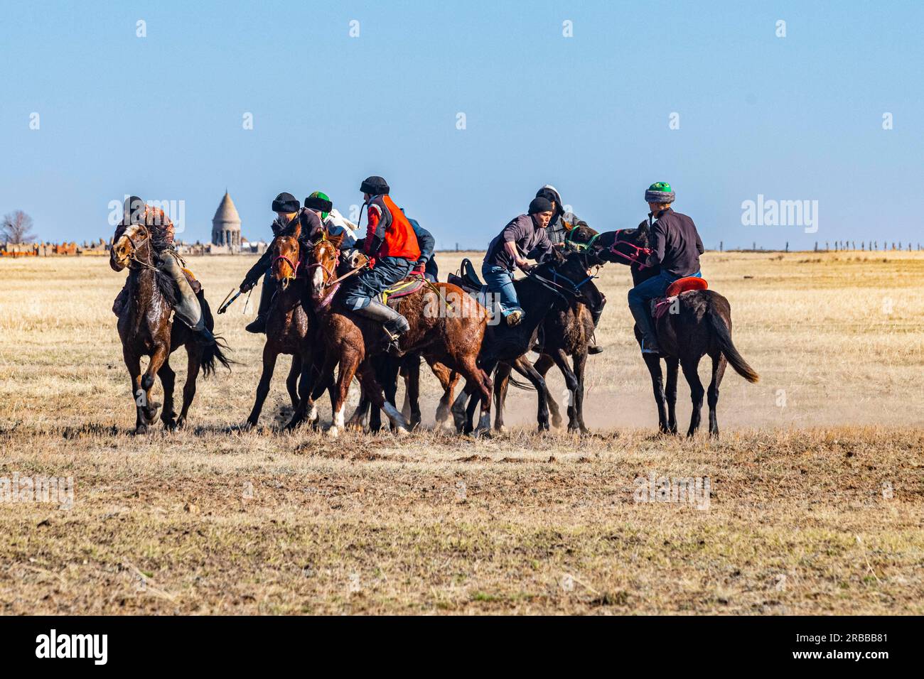 Men practising Kokpar, national horse game, Kazakhstan Stock Photo