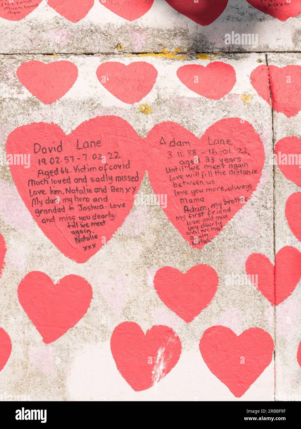 Closeup of r and Pink hearts on the The National Covid Memorial Wall, London, England, UK. Stock Photo