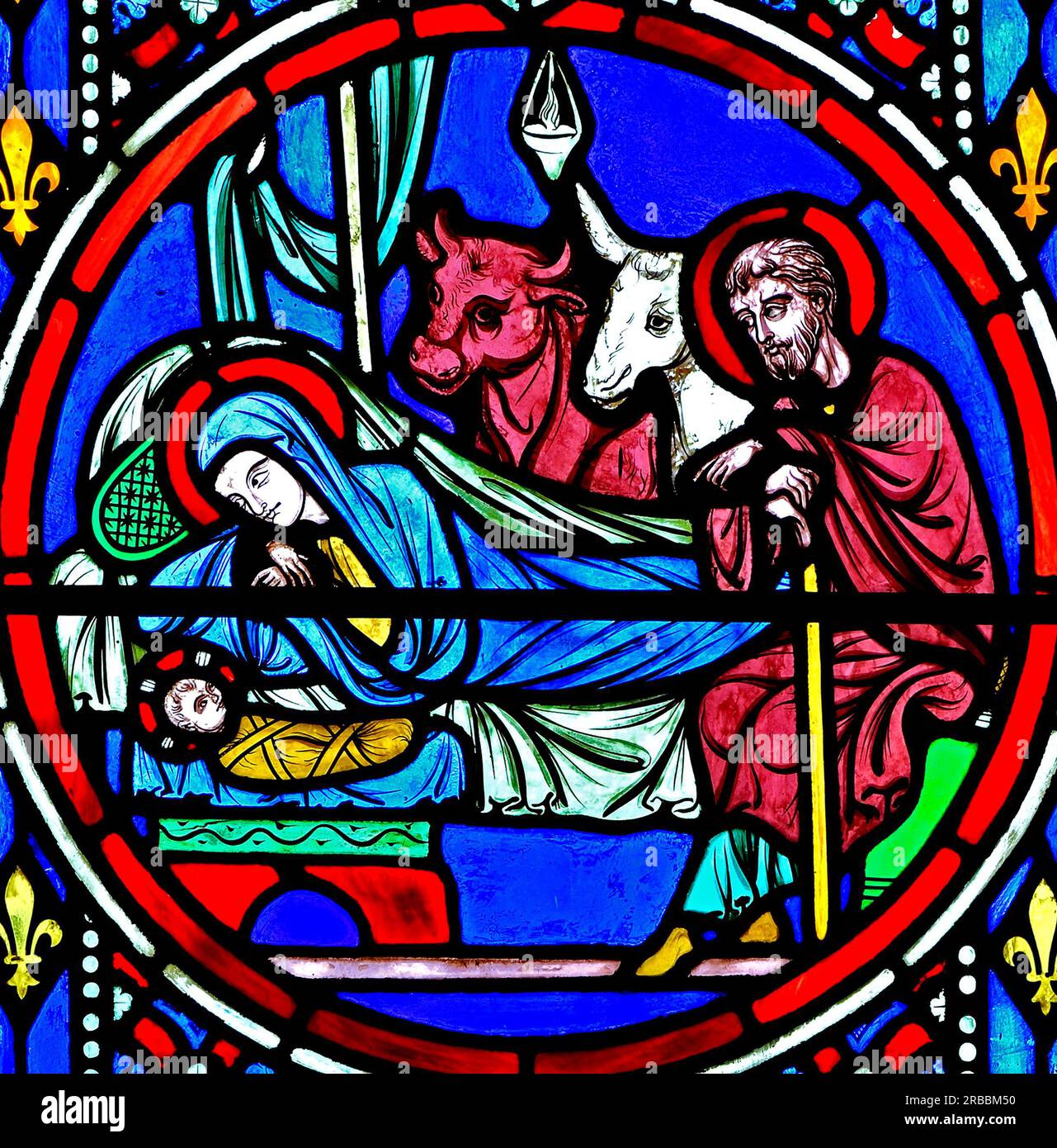 Nativity Window, stained glass by Oudinot of Paris, 1861, Feltwell Church, Norfolk, Nativity, stable, Mary, Joseph, new born baby Jesus, cattle Stock Photo