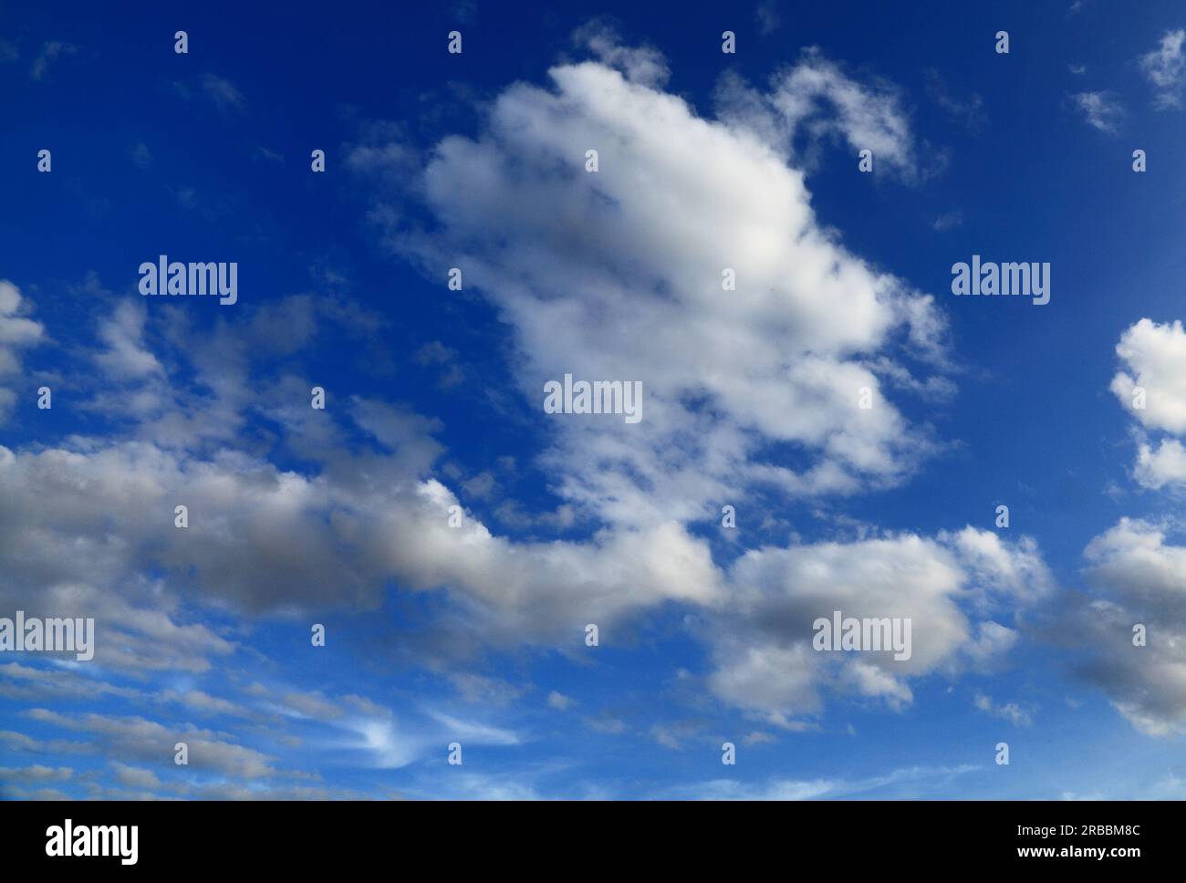 White cumulus cloud, clouds, blue sky, meteorology, weather, England Stock Photo