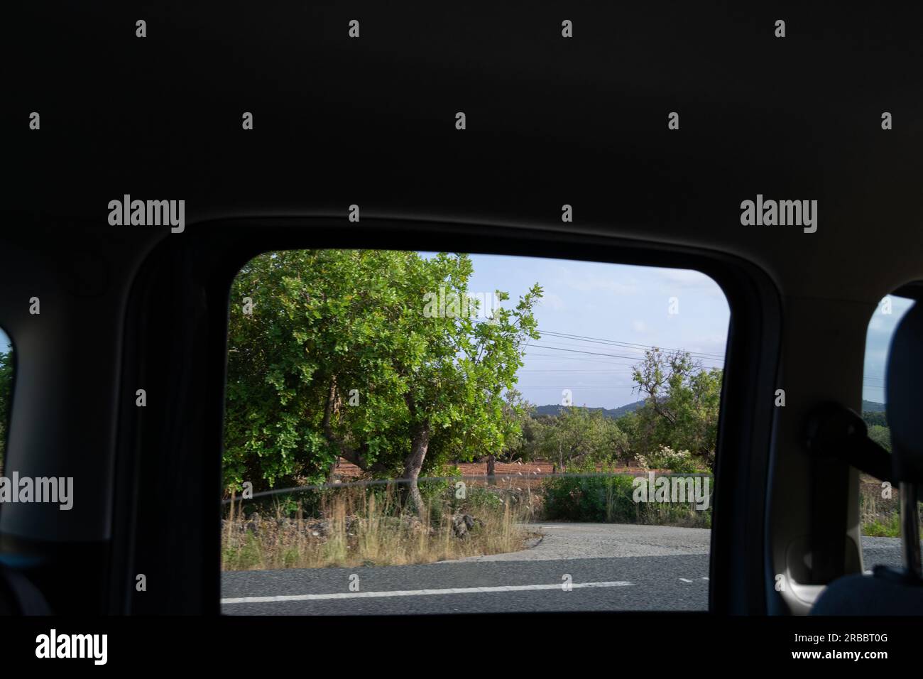 Car traveling, inside view trough window Stock Photo