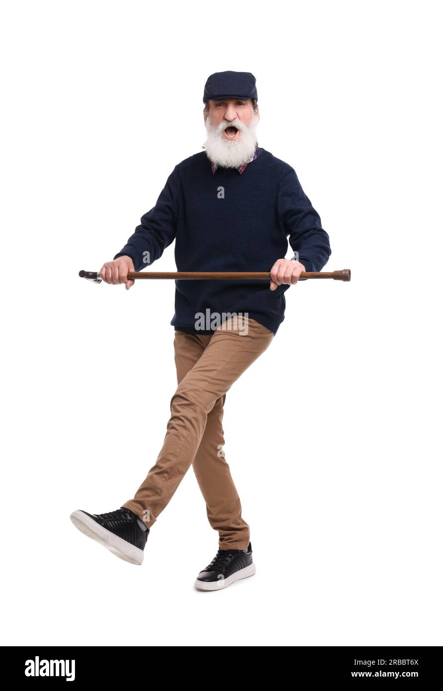Emotional senior man with walking cane on white background Stock Photo ...