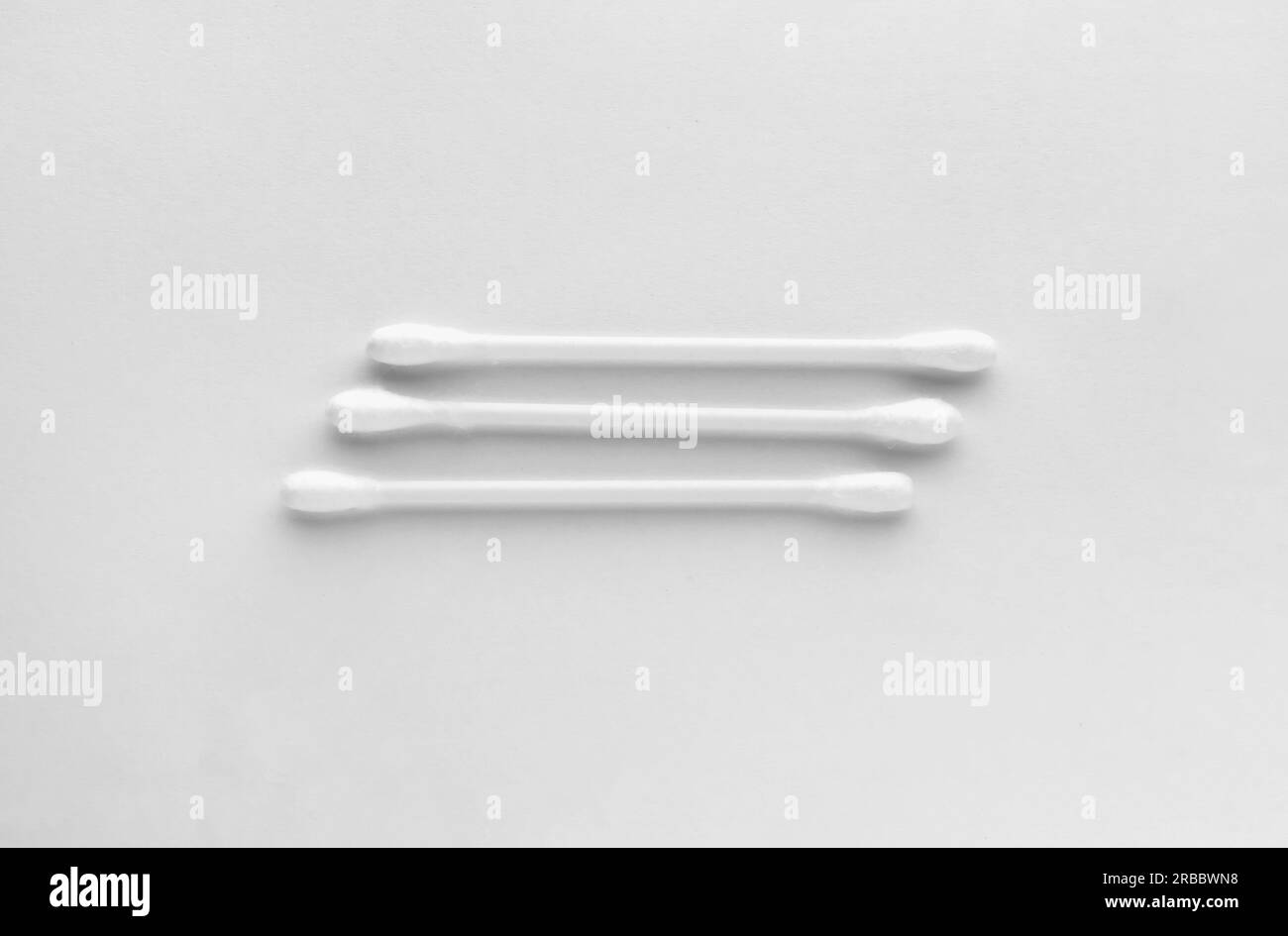 Clean cotton buds isolated on white, top view Stock Photo Alamy