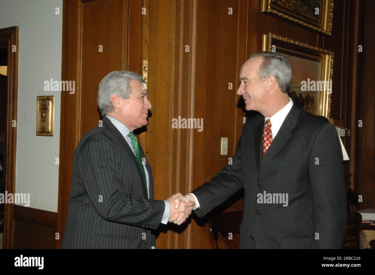 Secretary Dirk Kempthorne receiving visit at Main Interior from Philip Lader, head of the global media and comunications firm, WPP Group, and former U.S. Ambassador to the United Kingdom, as well as former Administrator of the Small Business Administration Stock Photo