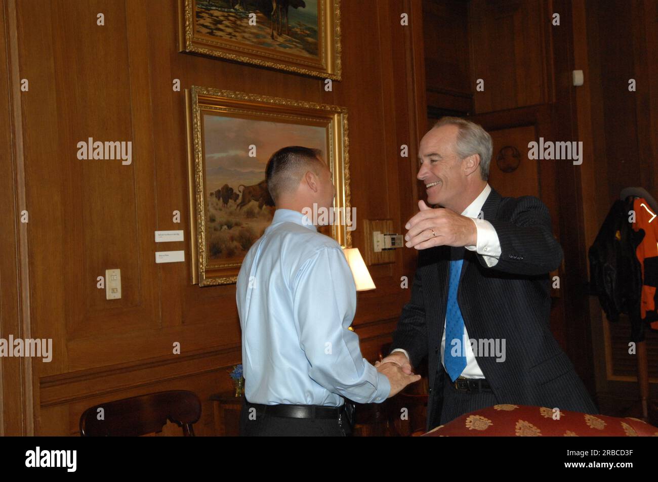 Secretary Dirk Kempthorne receiving visit at Main Interior from Cleveland Corder, professional boxer, International Boxing Council-National Boxing Association middleweight champion, from Boise, Idaho Stock Photo