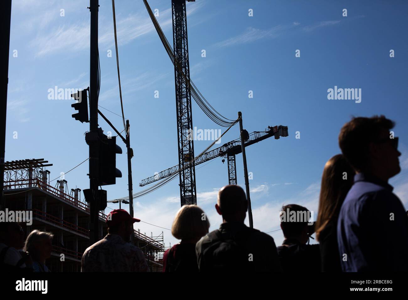 Germany Signal Berlin, Germany. 03rd June, 2023. Passers-by wait for the traffic light ...