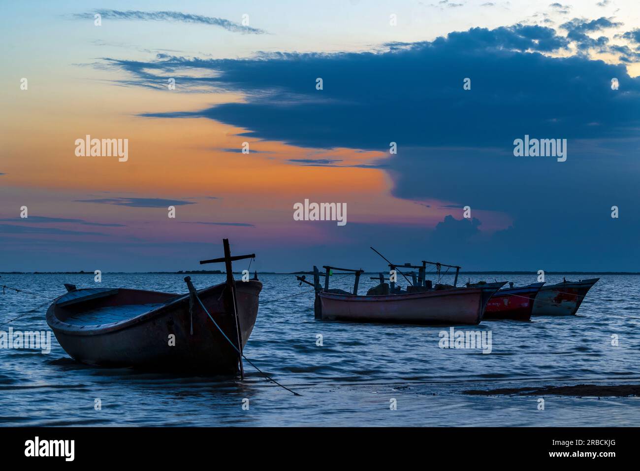 dhow boat at Gwadar beach during sunset time Stock Photo