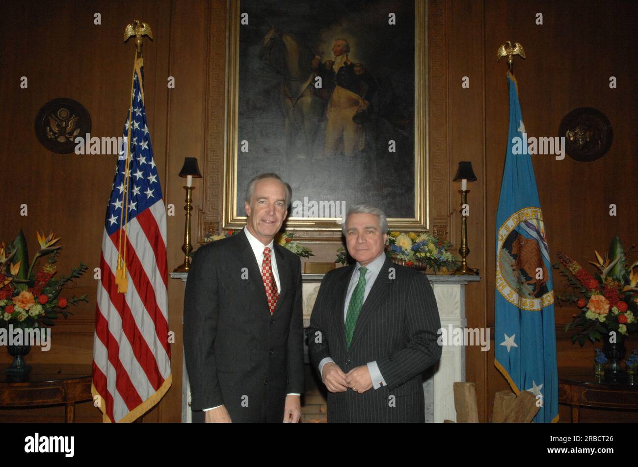 Secretary Dirk Kempthorne receiving visit at Main Interior from Philip Lader, head of the global media and comunications firm, WPP Group, and former U.S. Ambassador to the United Kingdom, as well as former Administrator of the Small Business Administration Stock Photo