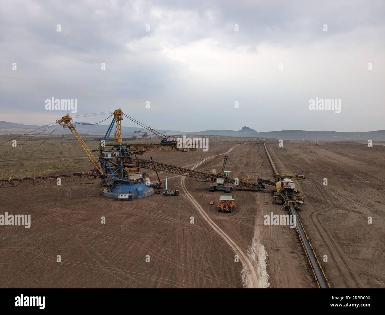 huge bucket wheel excavator digging operations in the brown coal mine in Most region of Czech republic,Europe,heavy machinery in recultivated landscap Stock Photo