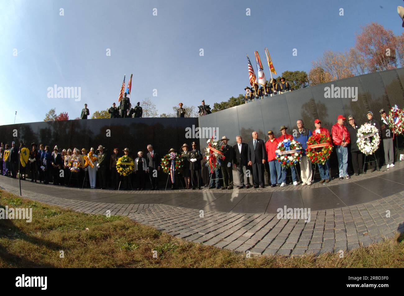 Veterans Day ceremony and aftermath at the Vietnam Veterans Memorial, Washington, D.C., where Secretary Dirk Kempthorne delivered the opening remarks, and joined participating dignitaries including the former Secretary of State and Chairman of the Joint Chiefs of Staff, General Colin Powell, along with Nebraska Senator Chuck Hagel, Vietnam Veterans Memorial Fund Founder and President Jan Scruggs, Vietnam Women's Memorial Foundation Founder and President Diane Carlson Evans, Mary 'Edie' Meeks of the Vietnam Women's Memorial Foundation, William Hansen of Lockheed Martin, and William Murdy of Com Stock Photo