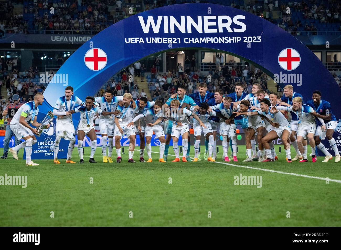 Batumi, Georgia. 08th July, 2023. BATUMI, GEORGIA - JULY 8: team captain Taylor Harwood-Bellis of England brings trophy to he's teammates, James Garner, Angel Gomes, Cameron Archer, Emile Smith Rowe, Levi Colwill, Max Aarons, Harvey Elliott, Noni Madueke, Cole Palmer, Morgan Gibbs-White, Curtis Jones, Anthony Gordon, Ben Johnson, James Trafford, Jarrad Branthwaite, Jarrad Branthwaite after victory during the UEFA Under-21 Euro 2023 final match between England and Spain on July 8, 2023 on Adjarabet Arena in Batumi, Georgia. Photo by Sebastian Frej Credit: Sebo47/Alamy Live News Stock Photo