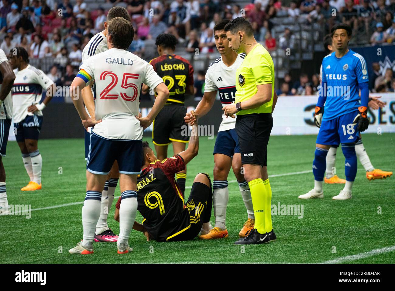 Vancouver, Canada. 08th July, 2023. Vancouver, British Columbia, Canada, July 8th 2023: Mathias Laborda (2 Vancouver Whitecaps FC) helps up Raul Ruidiaz (9 Seattle Sounders FC) after he falls during the Major League Soccer match between Vancouver Whitecaps FC and Seattle Sounders FC at BC Place Stadium in Vancouver, British Columbia, Canada (EDITORIAL USAGE ONLY). (Amy Elle/SPP) Credit: SPP Sport Press Photo. /Alamy Live News Stock Photo