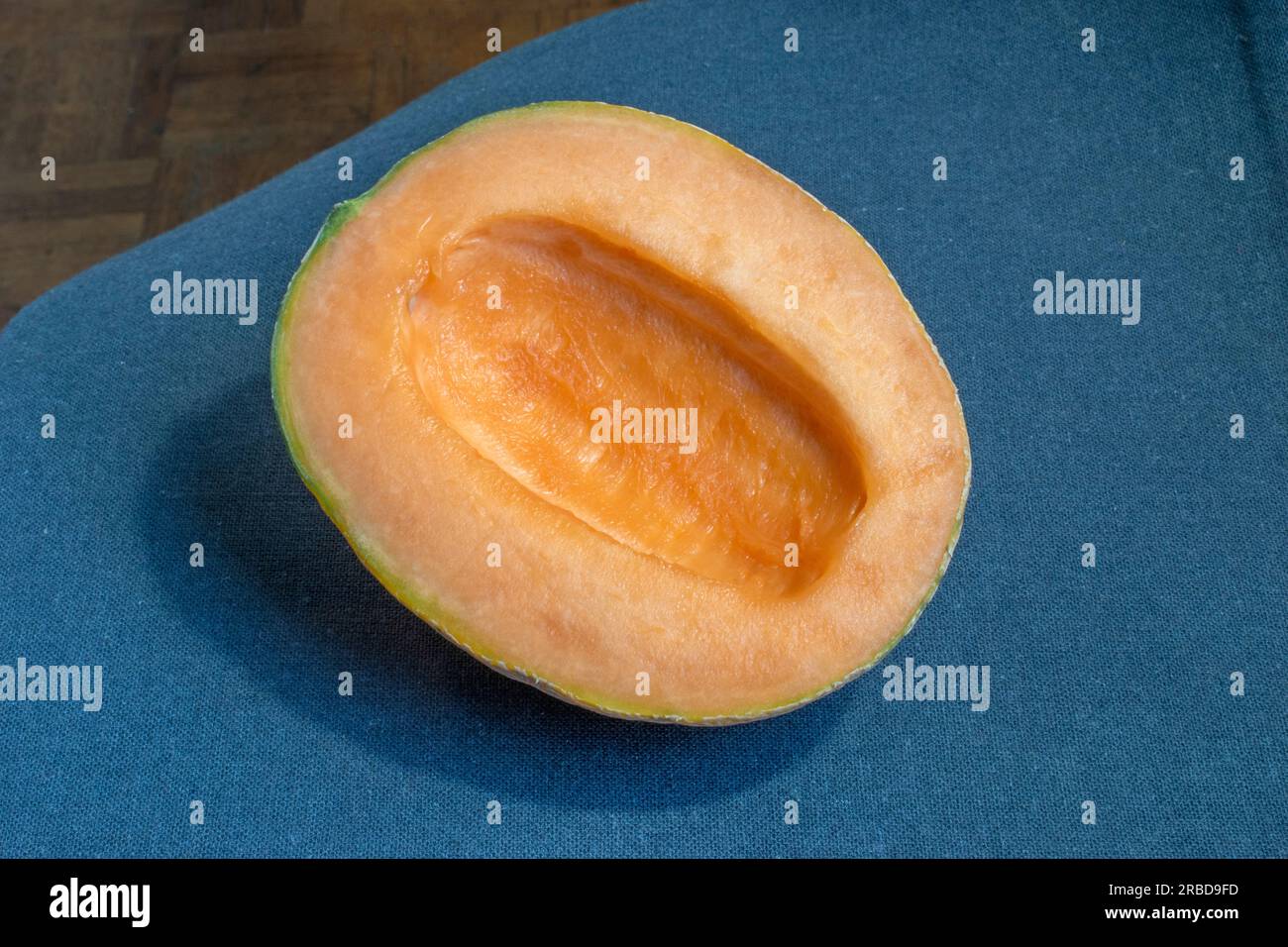 A closeup photo of a fresh and enticing cantaloupe melon, accentuated