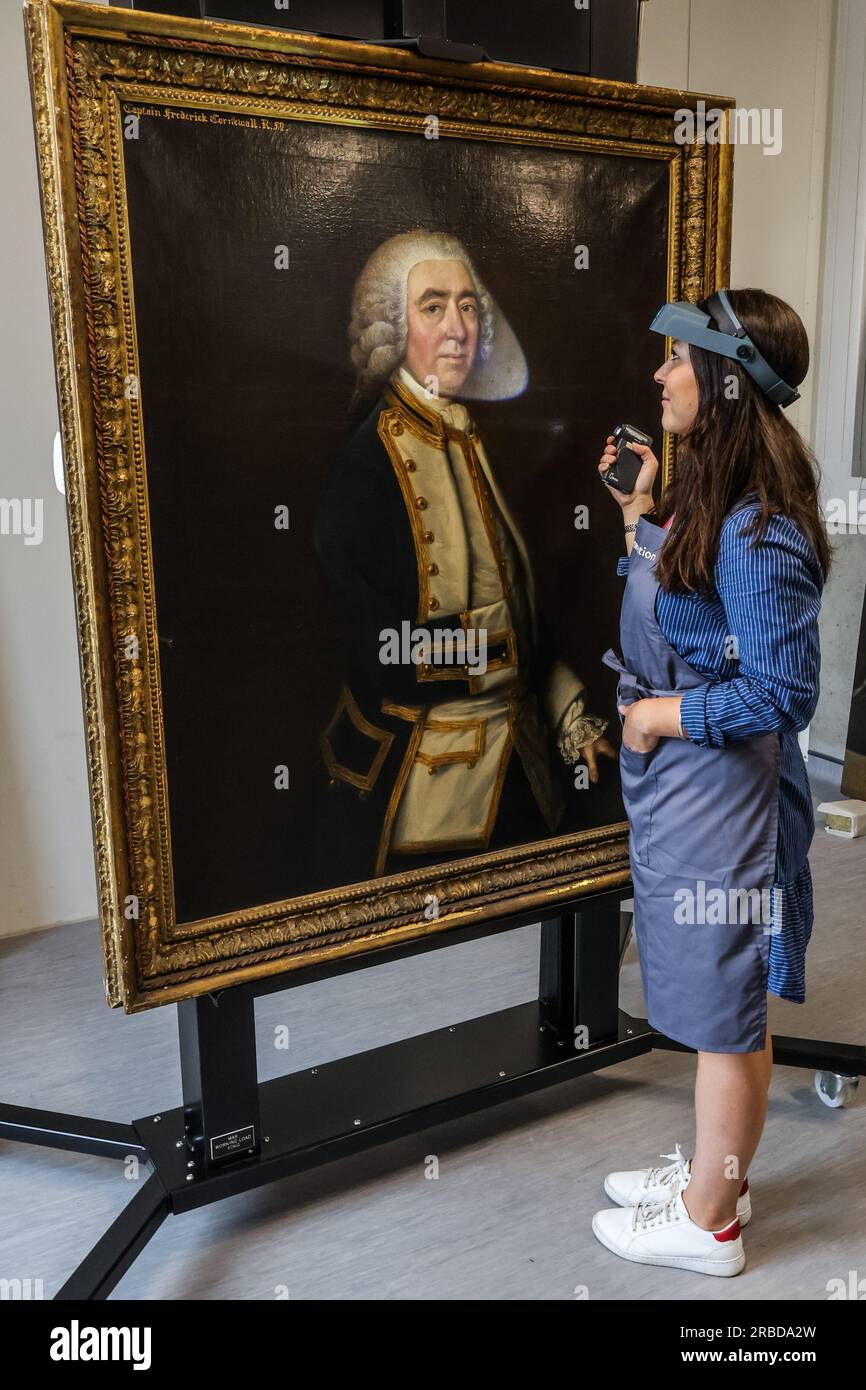 London, UK. 09th July, 2023. A Conservator seen shedding a light to the ...