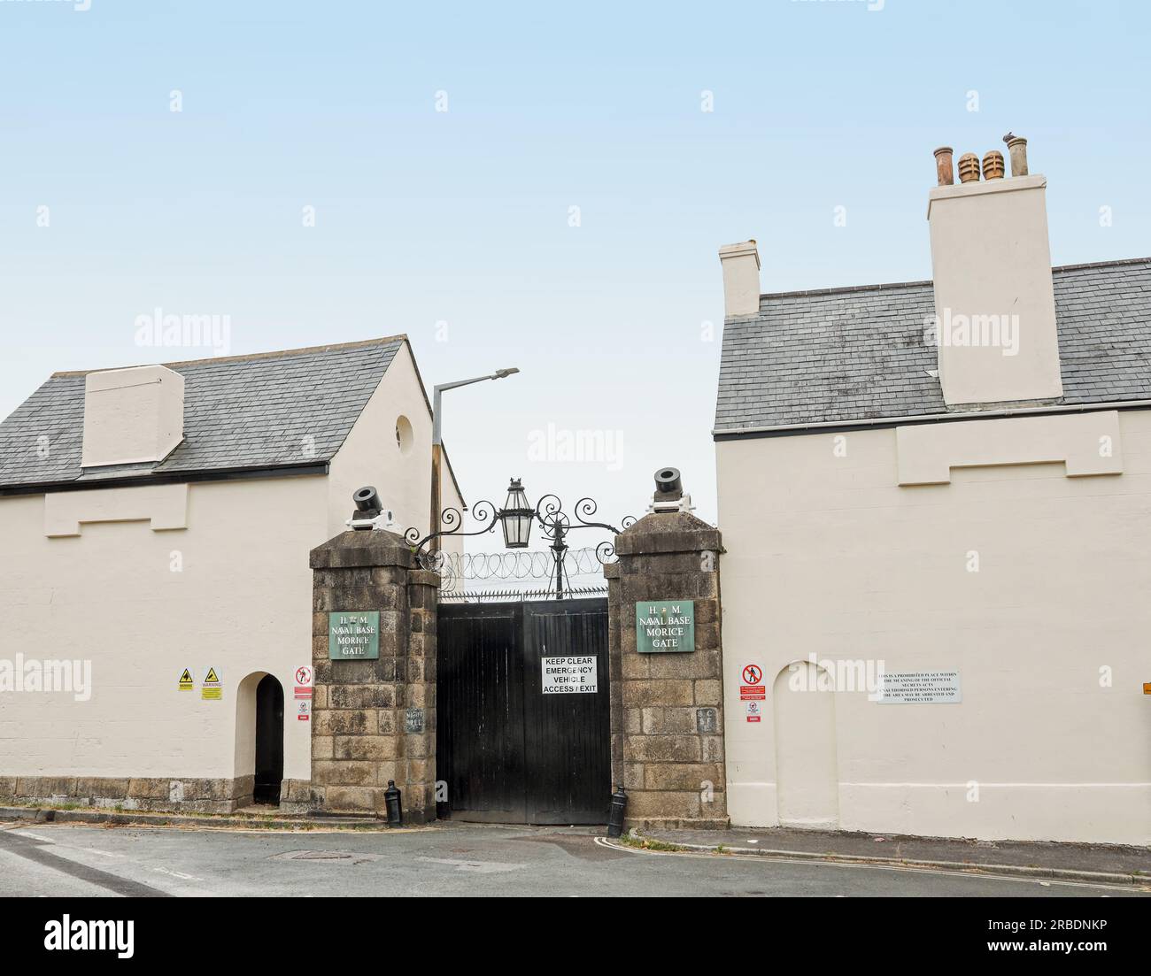 The historic Morice Gate at Devonport Dockyard, Gun Wharf, Plymouth. The historic gate and two gatehouses are Historic England listed Stock Photo