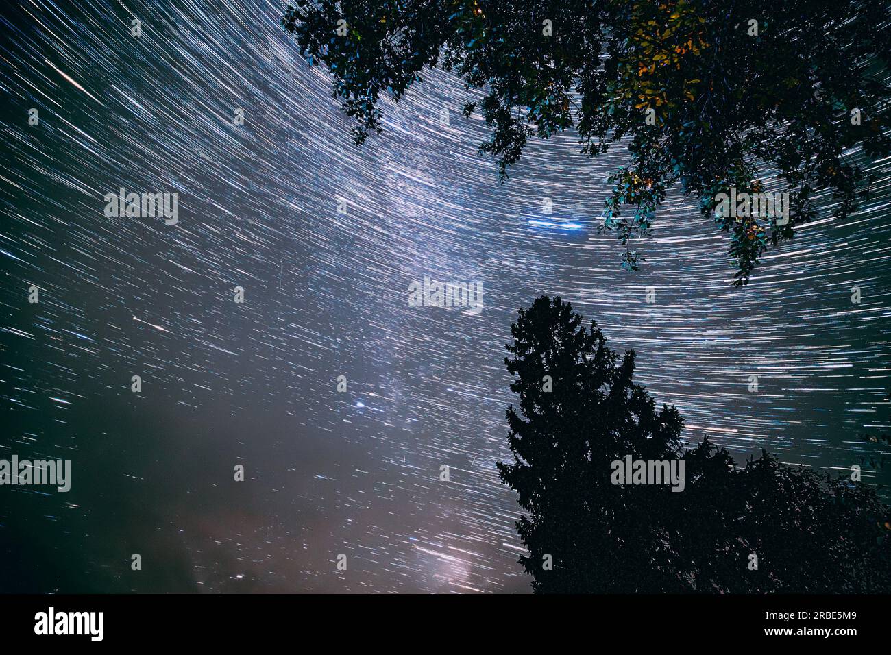 Cosmic Conception. . Amazing Star Trails In Sky. Night Starry Sky With ...