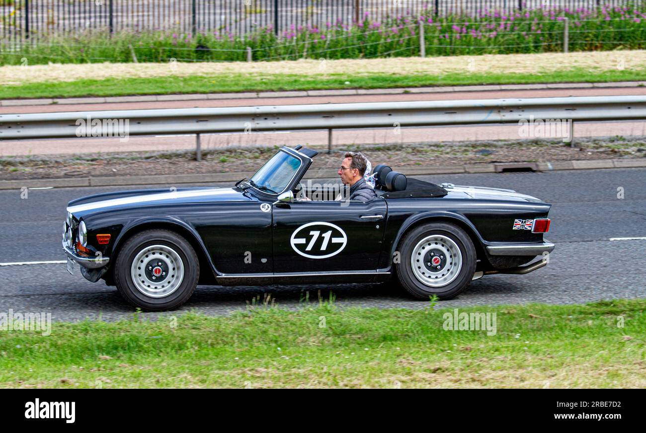 Dundee, Tayside, Scotland, UK. 9th July, 2023. UK Weather: Temperatures in Tayside Scotland reached 22°C this morning, besides the humid and bright July sunshine. Vintage classic and Concept car enthusiasts enjoy a Sunday drive along the Kingsway West Dual Carriageway in Dundee. Credit: Dundee Photographics/Alamy Live News Stock Photo