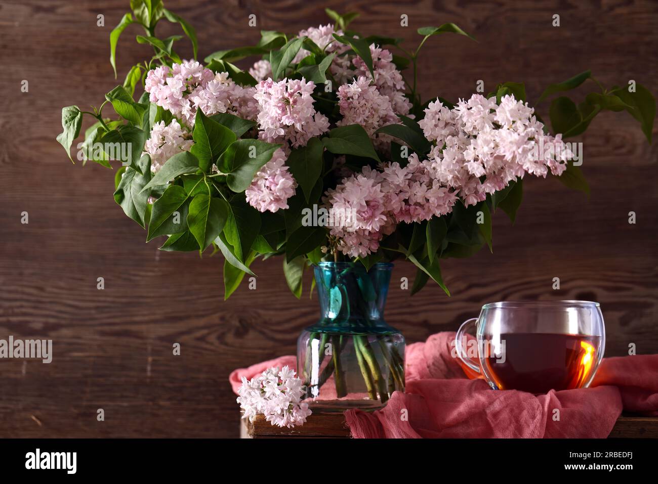 still life bouquet of lilacs and a cup of tea Stock Photo - Alamy
