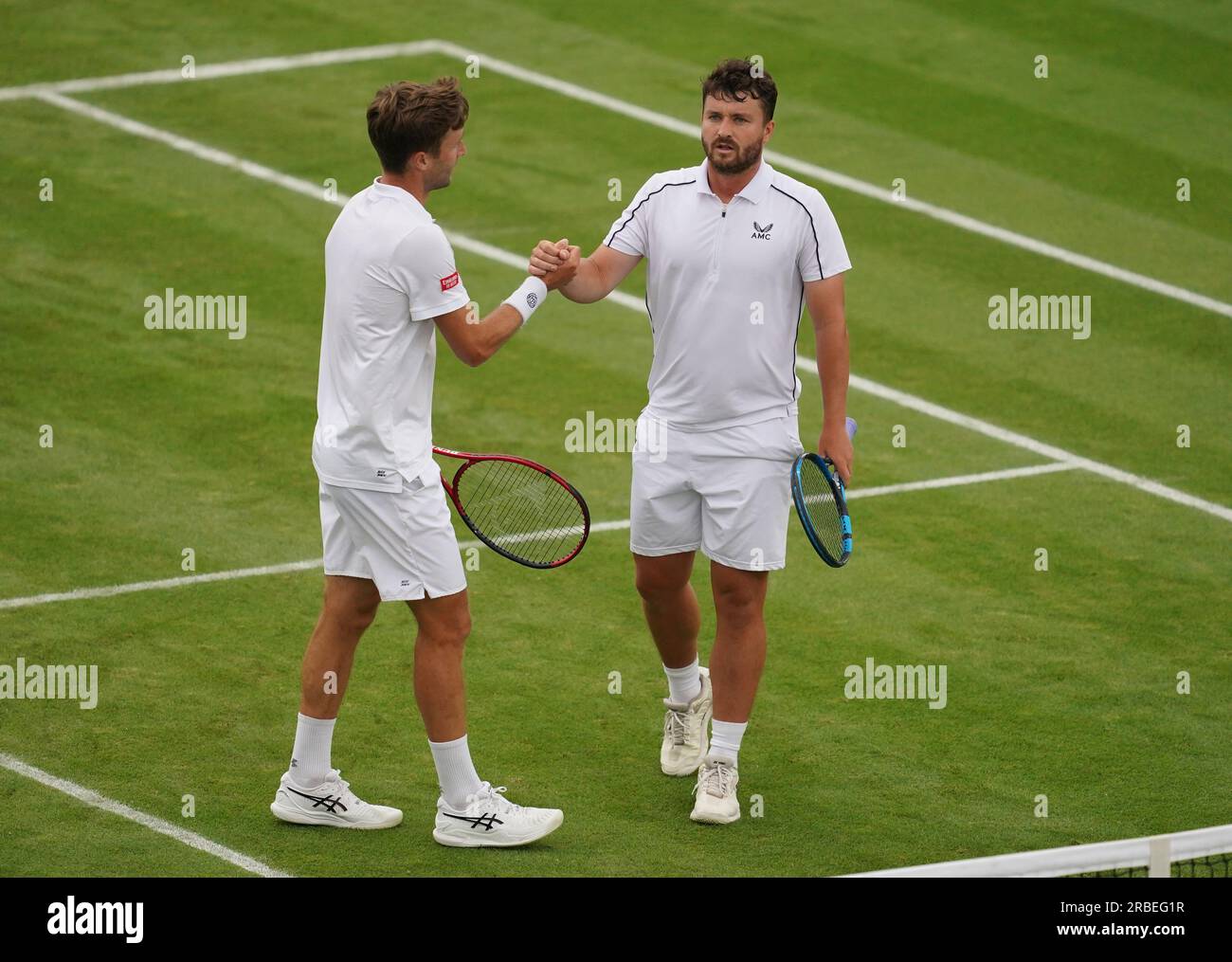 Jonny O'Mara (right) and Liam Broady (left) during their match against Rafael Matos and Francisco Cabral (not pictured) on day seven of the 2023 Wimbledon Championships at the All England Lawn Tennis and Croquet Club in Wimbledon. Picture date: Sunday July 9, 2023. Stock Photo