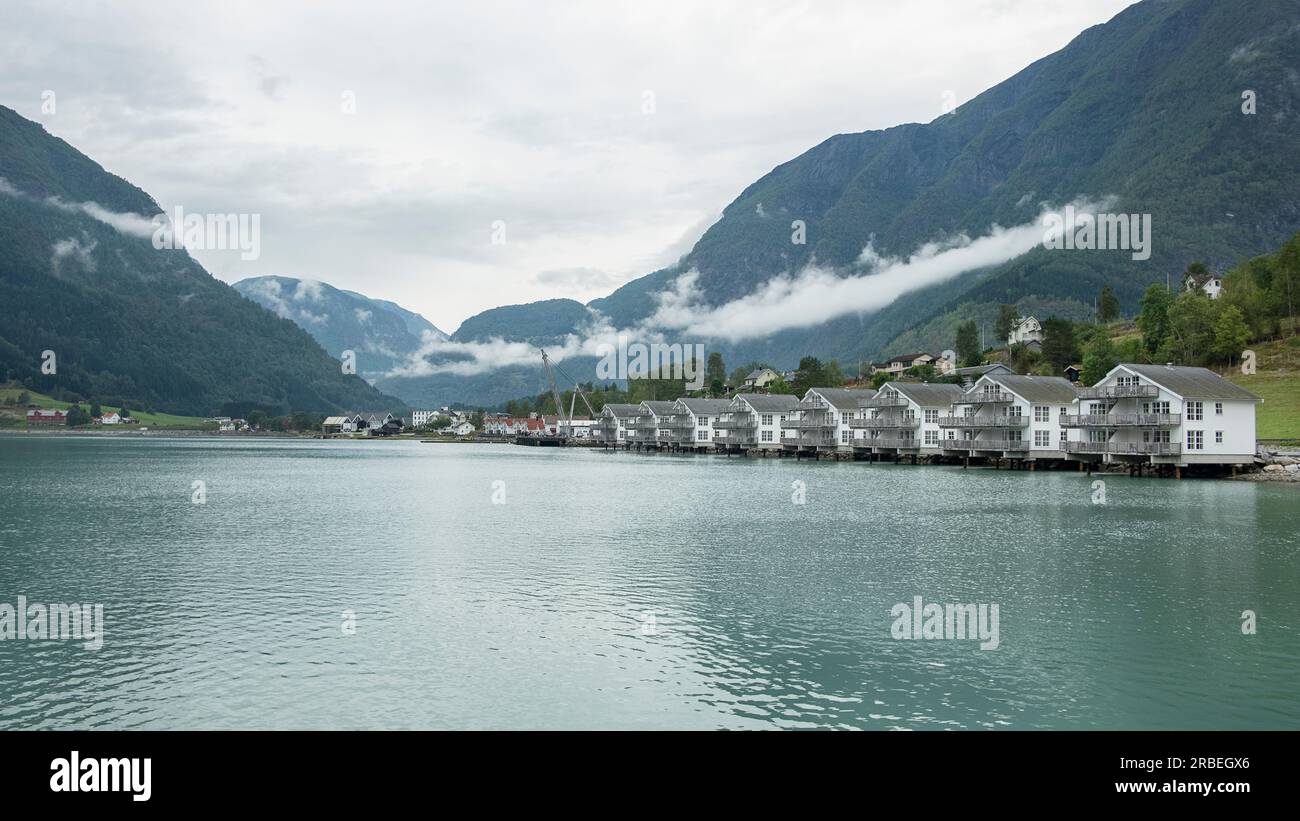 Cloudy day over the small village located at the inner end of the Sognefjord, the longest fjord in the country, surrounded by high mountains Stock Photo