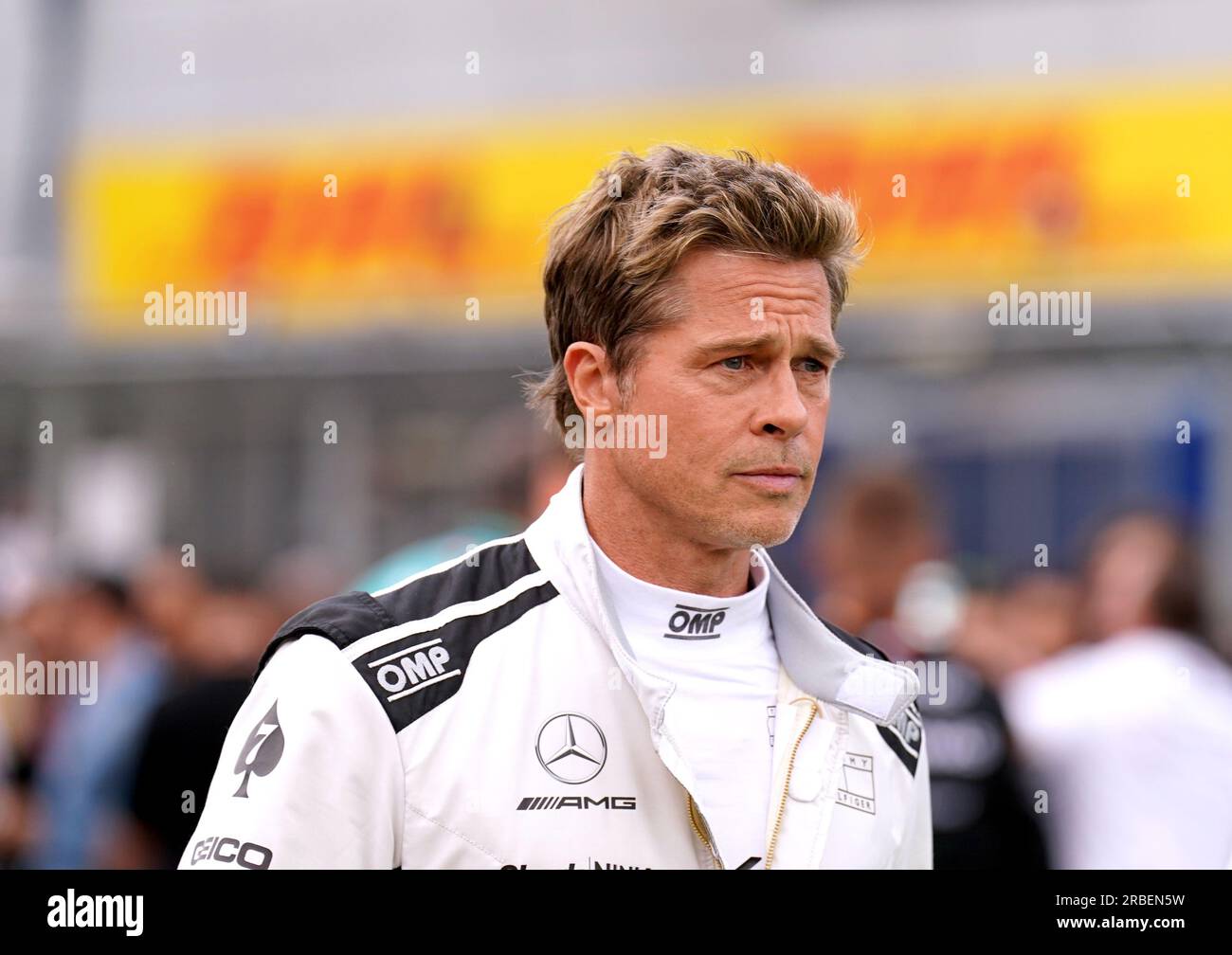 Brad Pitt filming for a formula one movie during the British Grand Prix