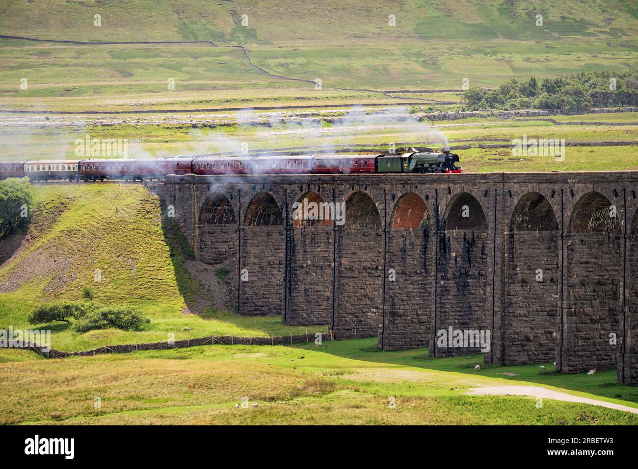 The Flying Scotsman Steam Train crossing The Ribblehead Viaduct, Yorkshire Dales, UK. Stock Photo