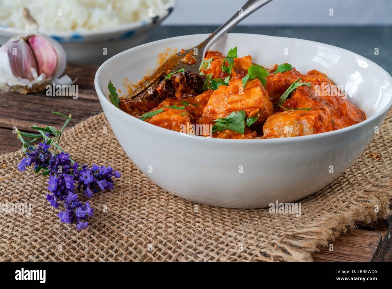 Salmon curry with basmati rice Stock Photo Alamy